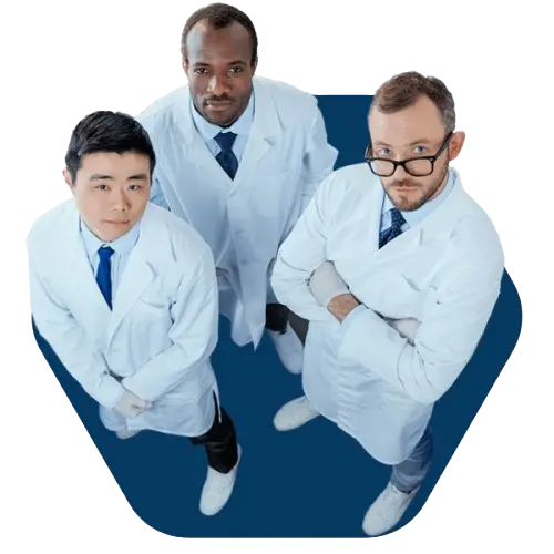Three scientists standing on blue floor